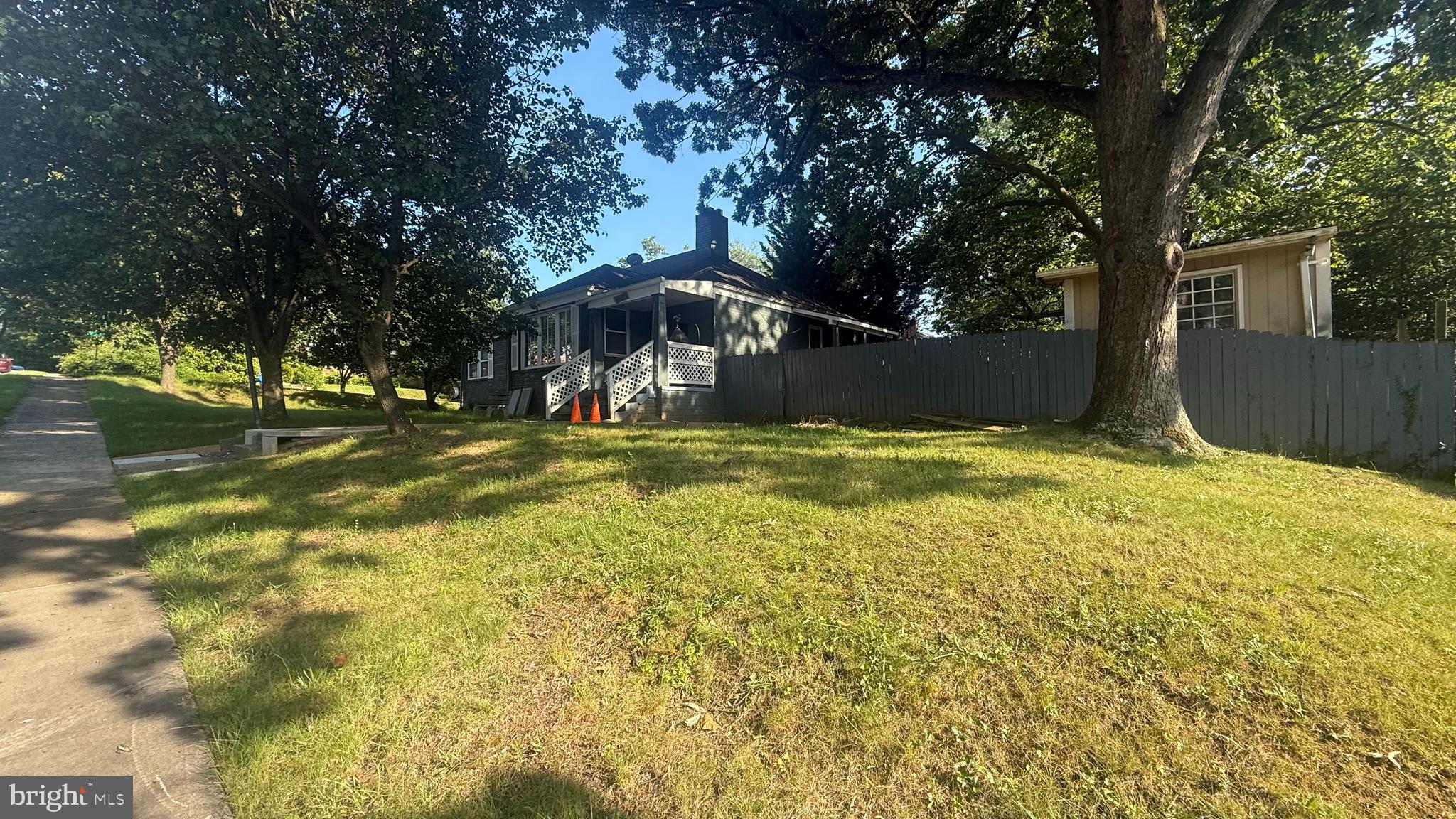 5603 Hawthorne Street Cheverly, MD 20785 - Photo 9 of 88 a view of a swimming pool with an outdoor space and seating area