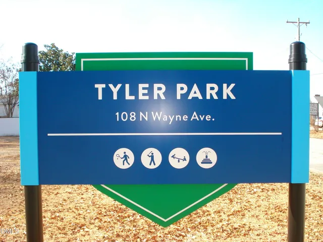 a patio with a table and chairs