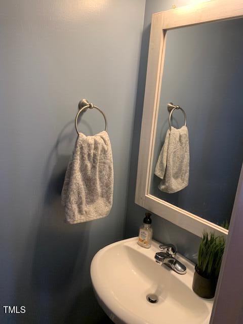 4910 Briarstone Court Raleigh, NC 27610 - Photo 14 of 34 half bath - level 2
