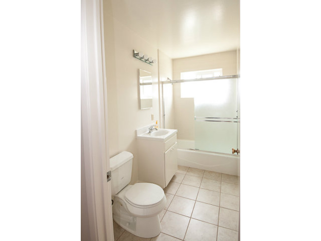 519 Piazza Drive Mountain View, CA 94043 - Photo 14 of 15 a bathroom with a toilet and a shower
