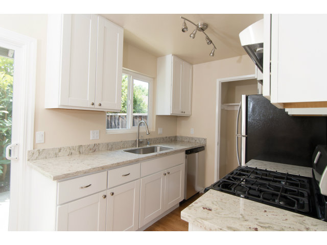 519 Piazza Drive Mountain View, CA 94043 - Photo 4 of 15 a kitchen with a sink and cabinets