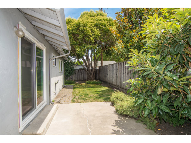 519 Piazza Drive Mountain View, CA 94043 - Photo 9 of 15 a view of small yard in front of house with wooden fence