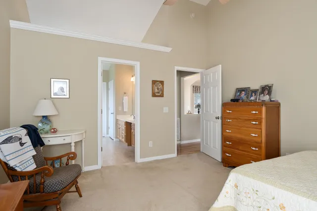 a bedroom with a bed and furniture