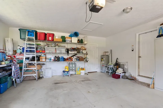 a view of a porch with chairs and wooden floor