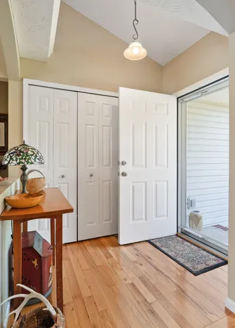 a very nice looking bedroom with a bed and a window