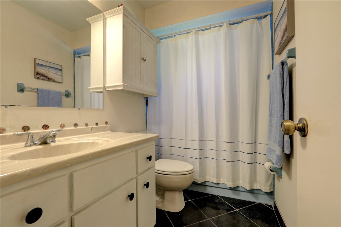 8205 Capewell Court Sebastian, FL 32958 - Photo 15 of 25 a bathroom with a sink toilet and shower