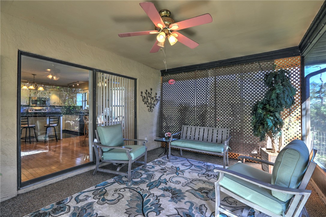 8205 Capewell Court Sebastian, FL 32958 - Photo 18 of 25 a living room with furniture and a rug