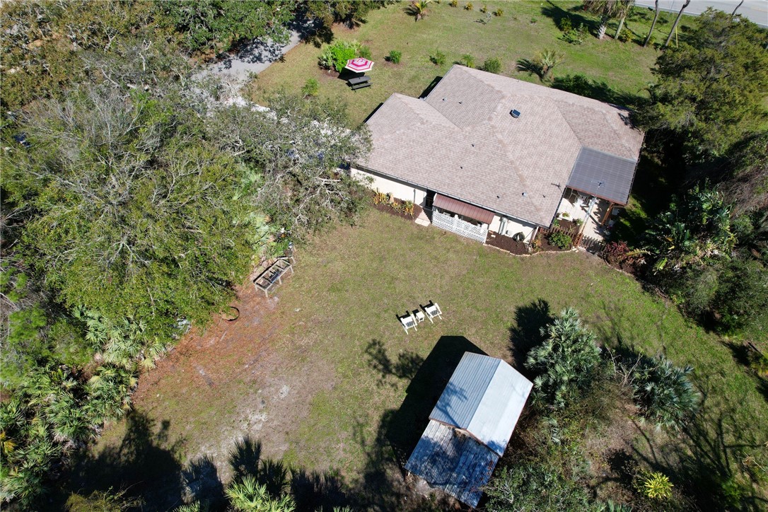 8205 Capewell Court Sebastian, FL 32958 - Photo 3 of 25 an aerial view of house with yard swimming pool and outdoor seating