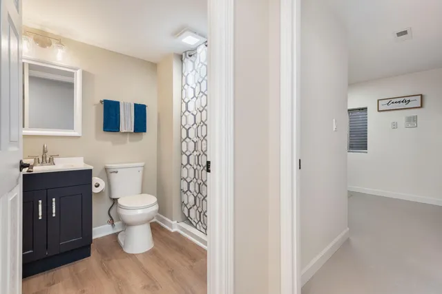 a bathroom with a toilet and a sink