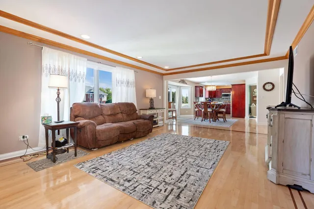 a living room with furniture and a rug