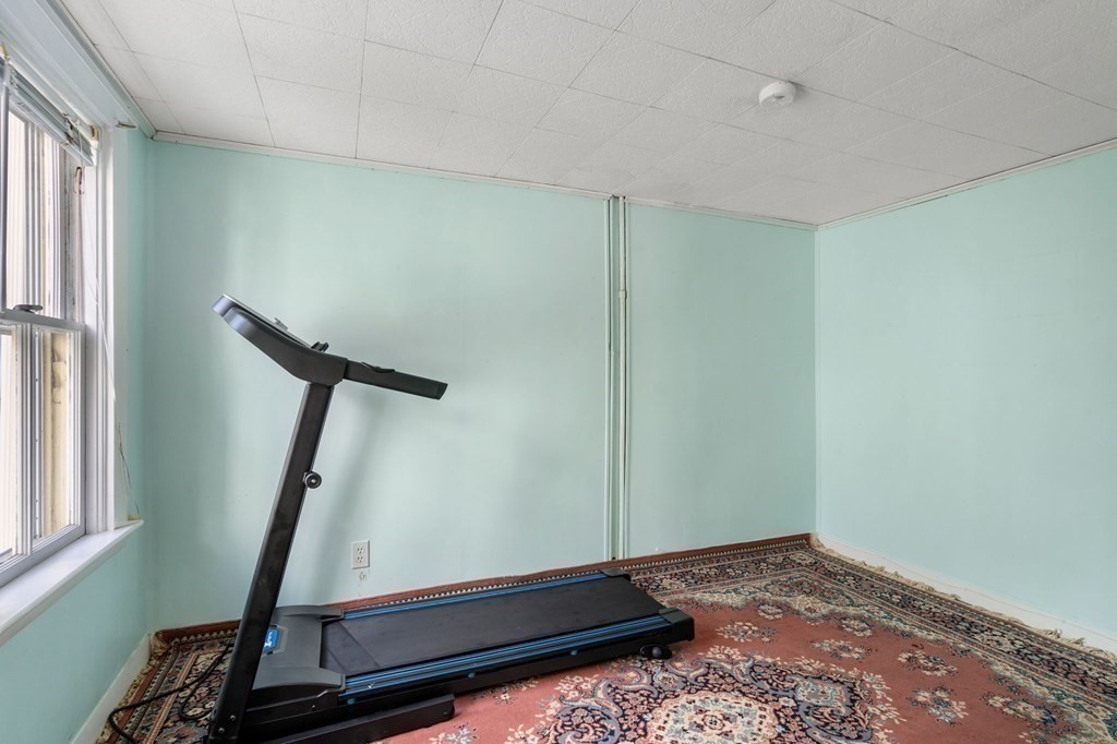 12 Spring Street Newton, MA 02464 - Photo 17 of 42 a view of a room with gym equipment