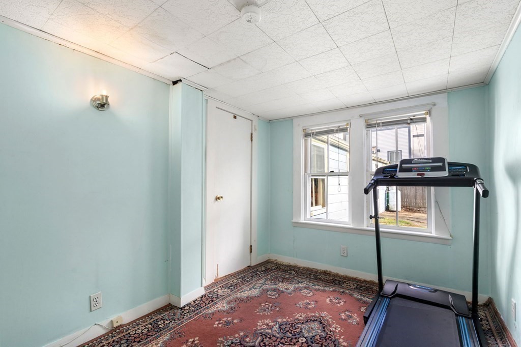 12 Spring Street Newton, MA 02464 - Photo 19 of 42 a view of a livingroom with window and furniture