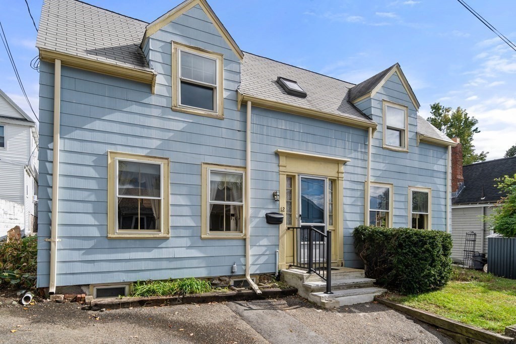 12 Spring Street Newton, MA 02464 - Photo 2 of 42 a front view of a house
