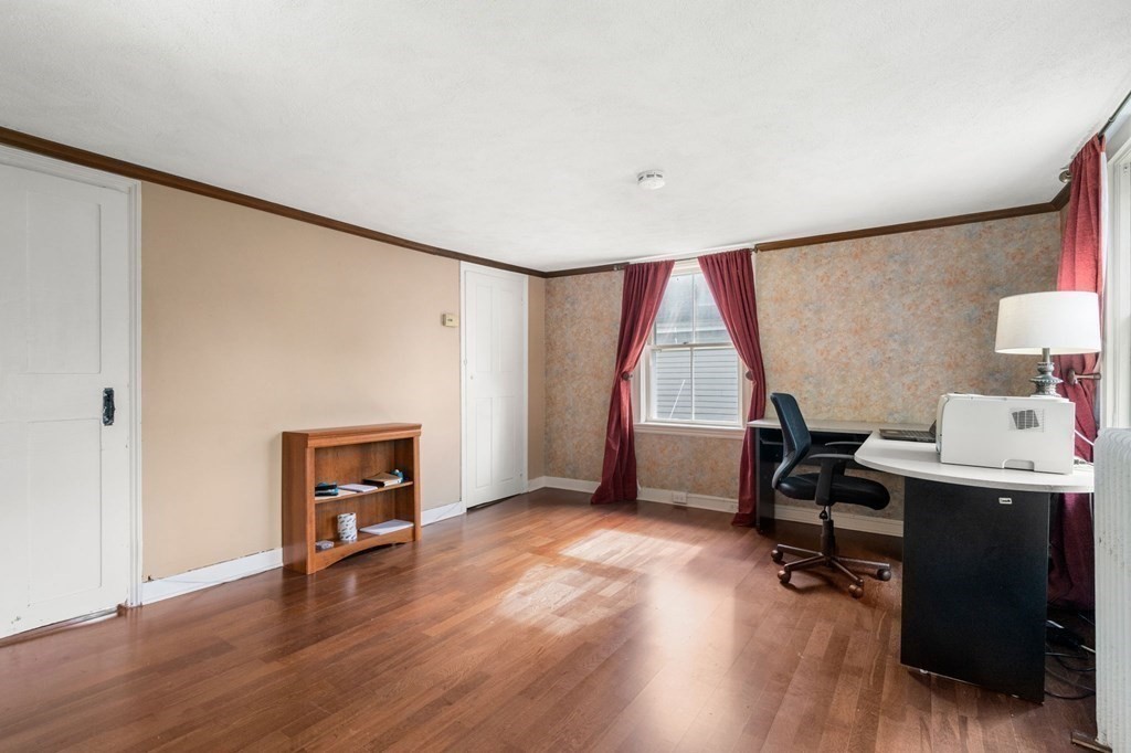 12 Spring Street Newton, MA 02464 - Photo 23 of 42 a view of a workspace with furniture and a window