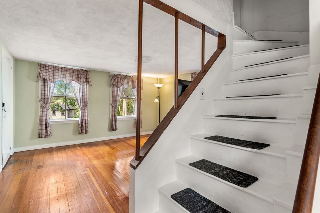 12 Spring Street Newton, MA 02464 - Photo 27 of 42 a view of an entryway with wooden floor