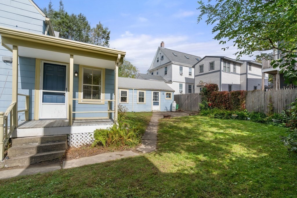 12 Spring Street Newton, MA 02464 - Photo 37 of 42 a front view of a house with garden