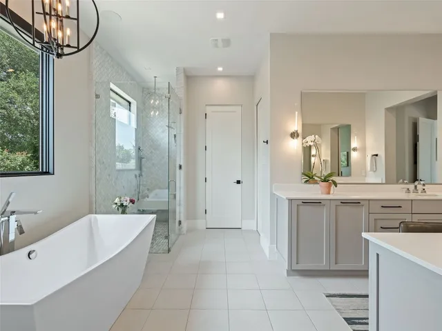 a bathroom with a sink a toilet a mirror and vanity