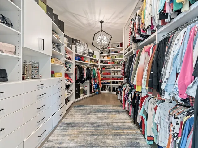 a kitchen with a stove and cabinets