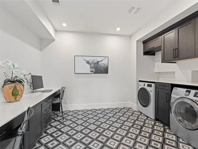 a view of a backyard with table and chairs and a fire pit
