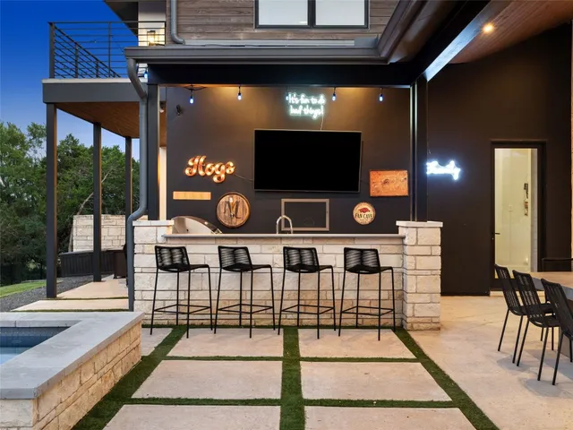 a view of a swimming pool with seating area