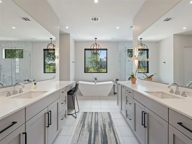 a view of a workspace with furniture and window