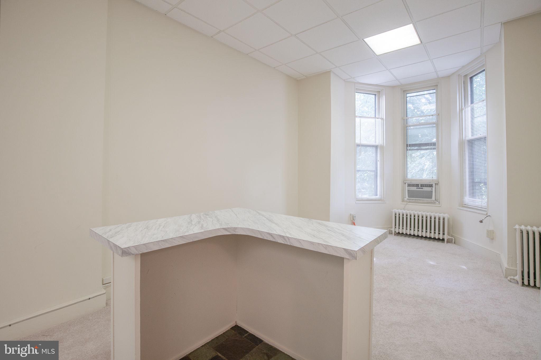 109 North Lime Street, Unit 2 Lancaster, PA 17602 - Photo 15 of 22 a view of an empty room with a window