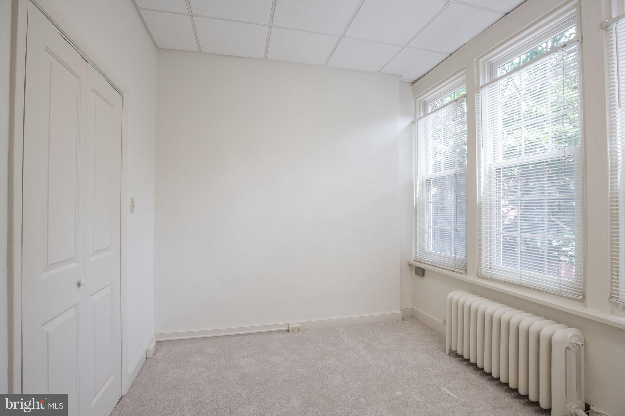 109 North Lime Street, Unit 2 Lancaster, PA 17602 - Photo 16 of 22 a view of an empty room with a window