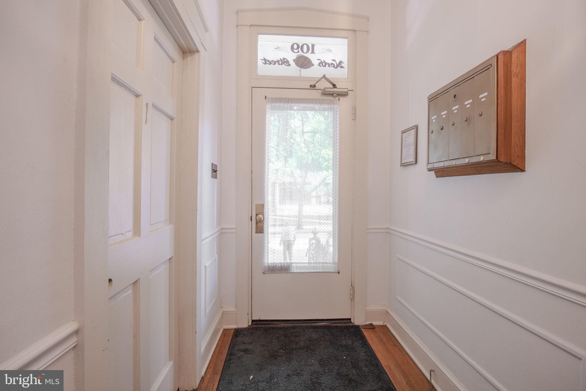 109 North Lime Street, Unit 2 Lancaster, PA 17602 - Photo 5 of 22 a view of room with window and hallway