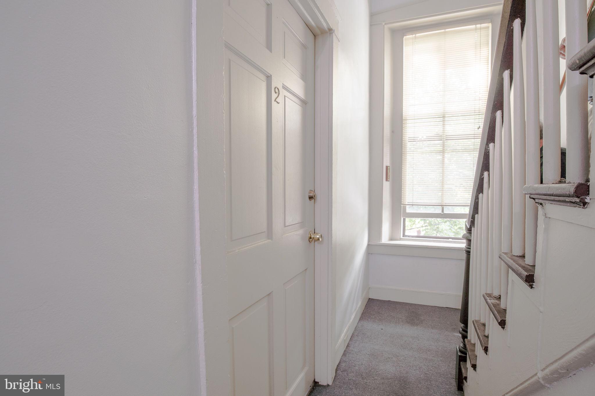 109 North Lime Street, Unit 2 Lancaster, PA 17602 - Photo 8 of 22 a view of an empty room with a window