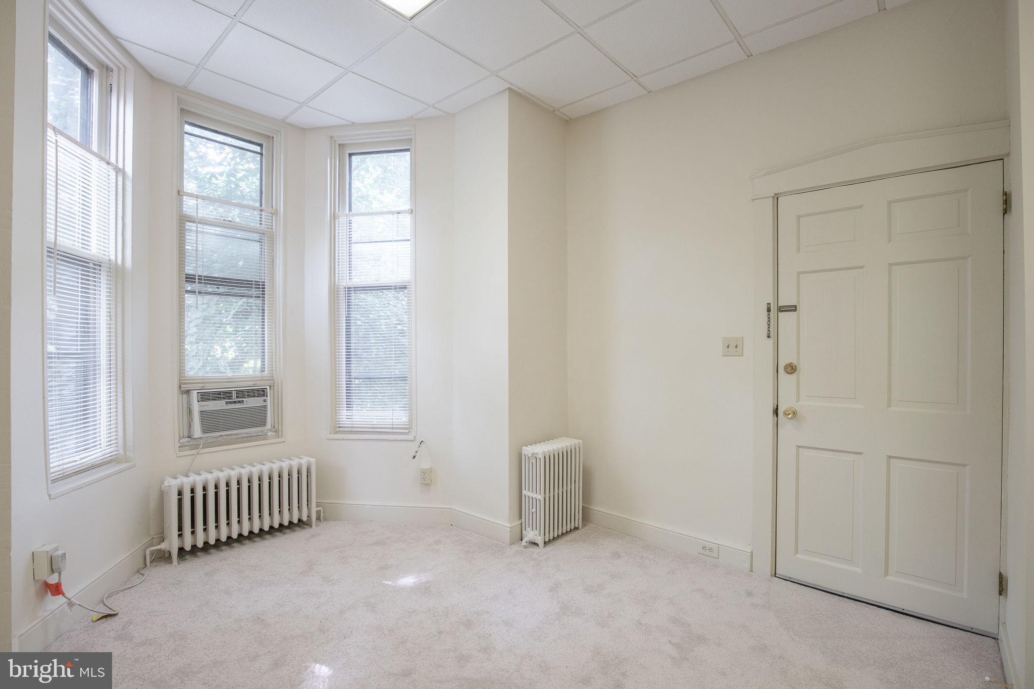 109 North Lime Street, Unit 2 Lancaster, PA 17602 - Photo 9 of 22 an empty room with windows