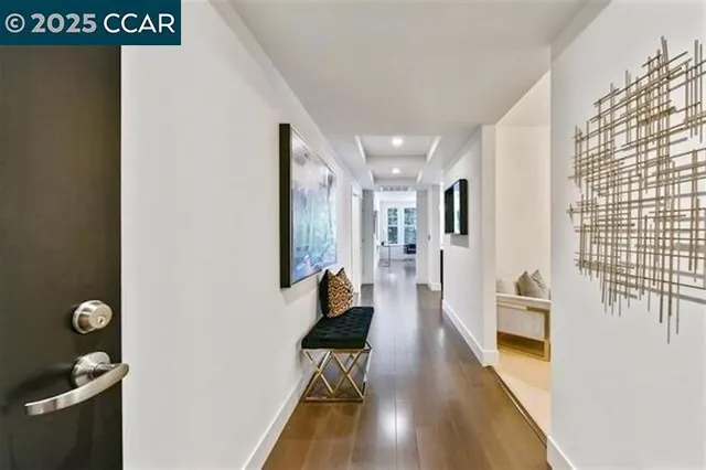a hallway with wooden floor