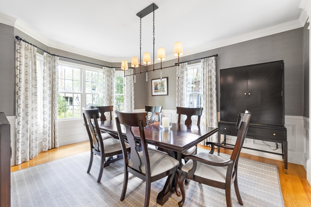 80 Emerson Road Needham, MA 02492 - Photo 12 of 41 a view of a dining room with furniture window and wooden floor