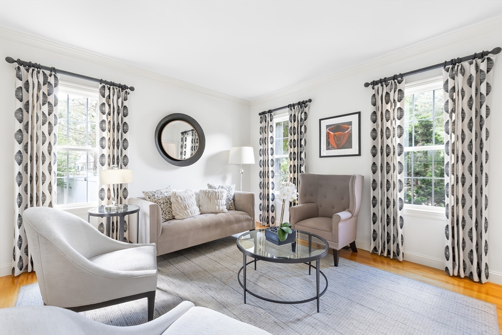 80 Emerson Road Needham, MA 02492 - Photo 14 of 41 a living room with furniture and a large window