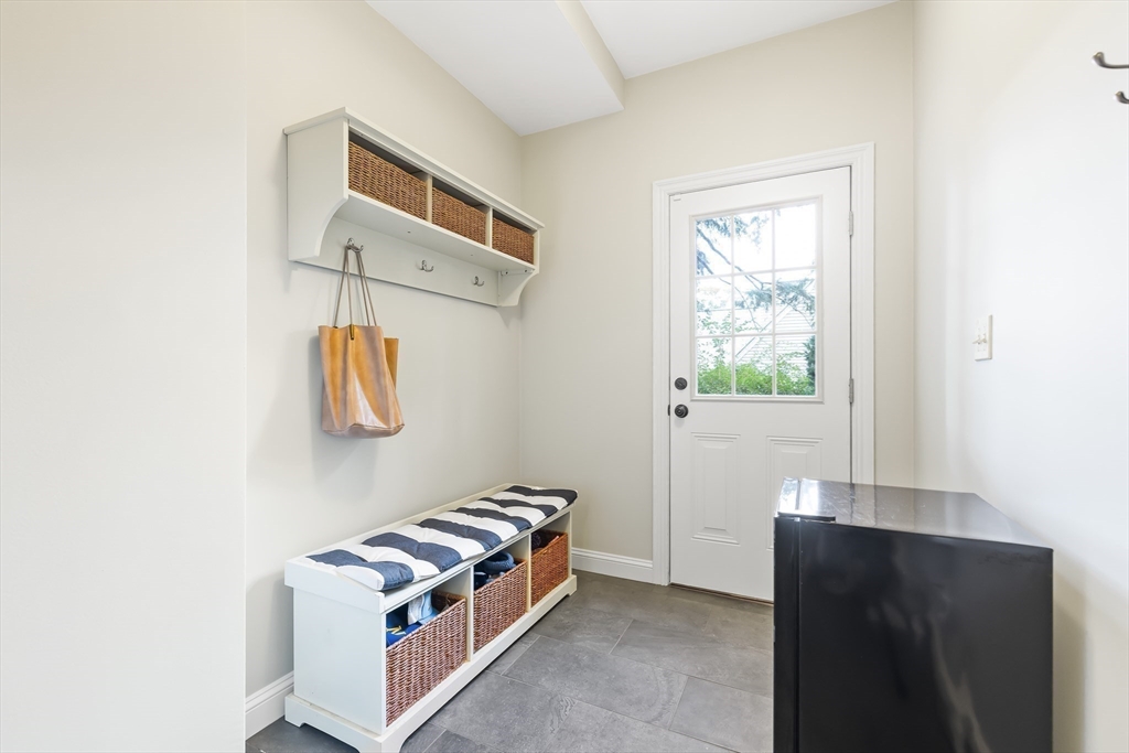 80 Emerson Road Needham, MA 02492 - Photo 16 of 41 a room with a window and a table