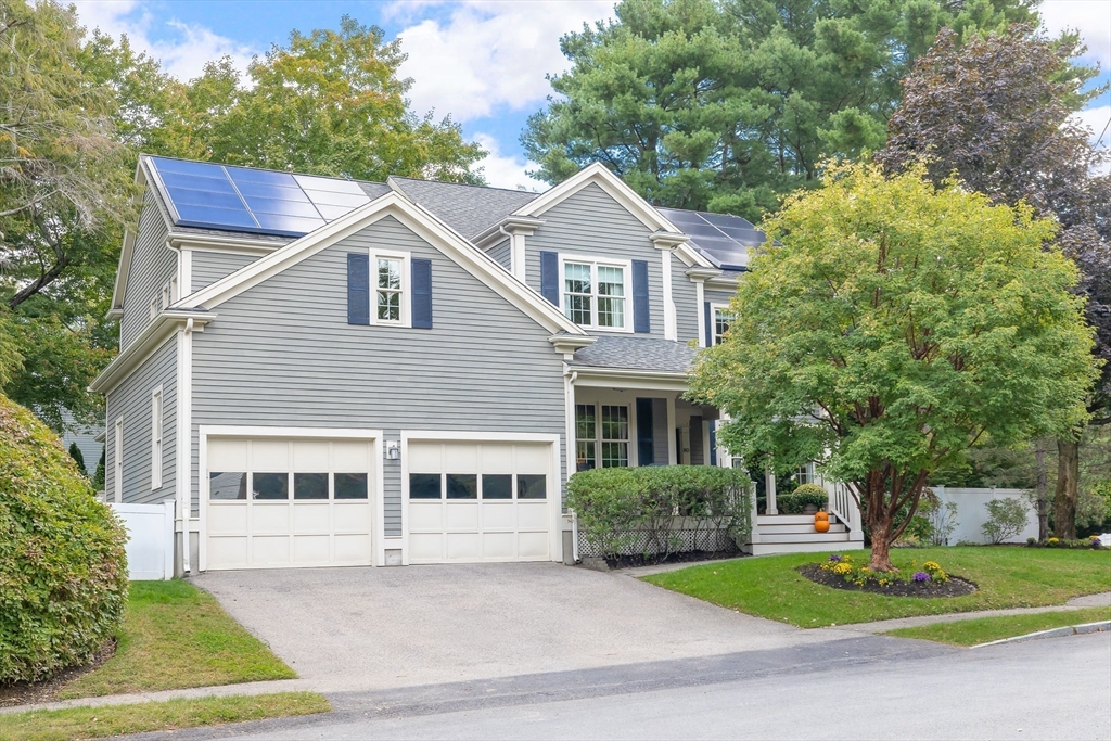80 Emerson Road Needham, MA 02492 - Photo 2 of 41 a front view of a house with a yard