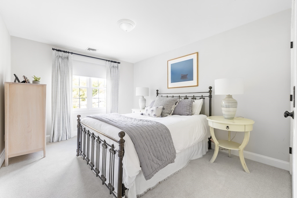 80 Emerson Road Needham, MA 02492 - Photo 26 of 41 a bedroom with a bed and a window