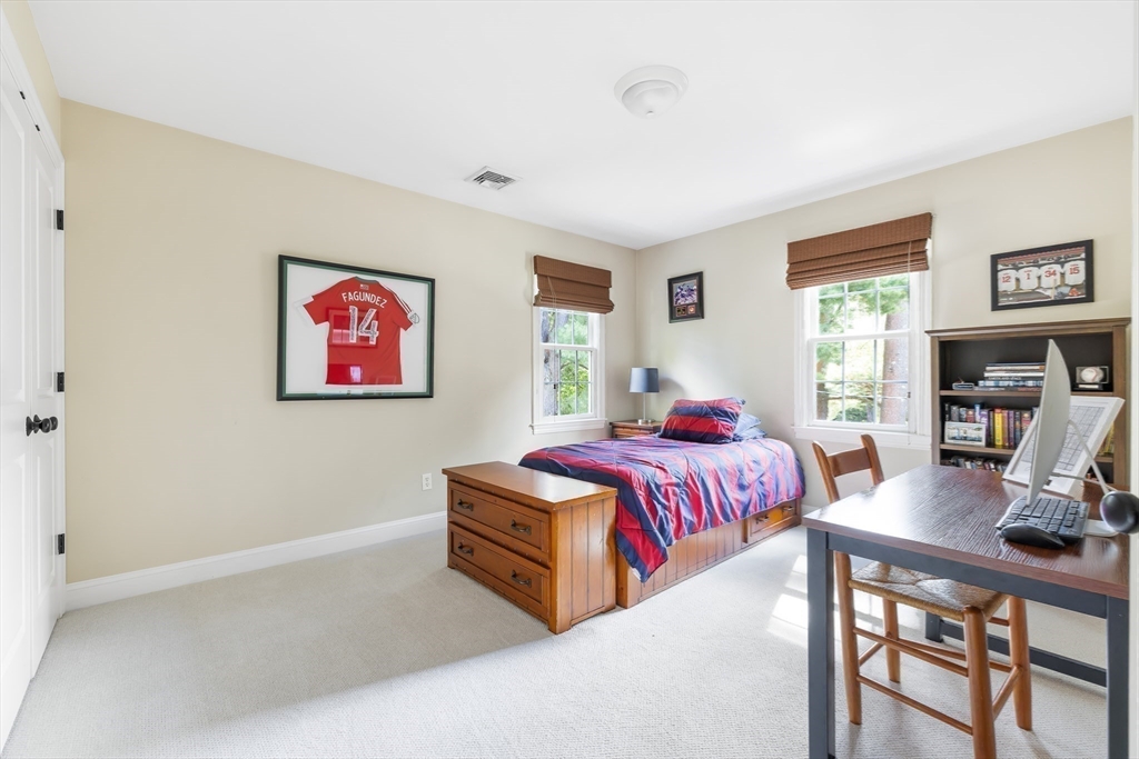 80 Emerson Road Needham, MA 02492 - Photo 27 of 41 a bedroom with bed and a window