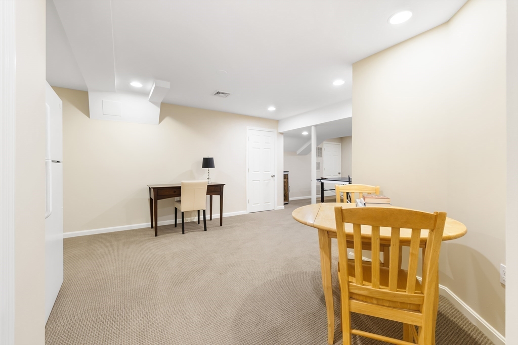 80 Emerson Road Needham, MA 02492 - Photo 32 of 41 a view of a room with furniture and window