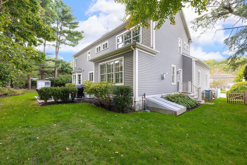 80 Emerson Road Needham, MA 02492 - Photo 38 of 41 a view of a house with backyard and sitting area