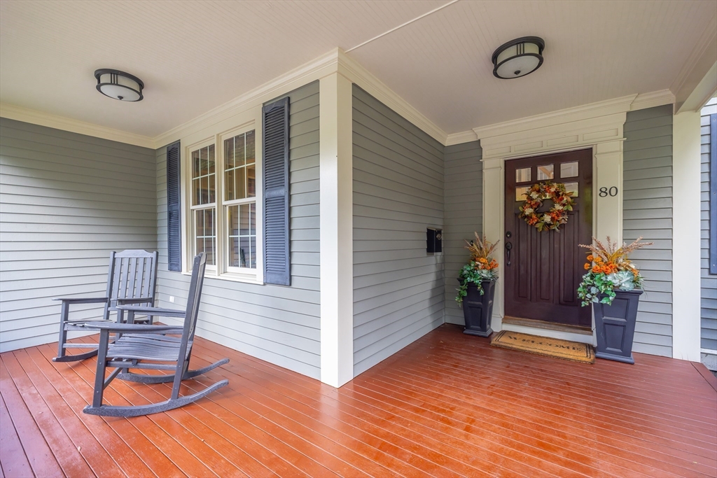 80 Emerson Road Needham, MA 02492 - Photo 4 of 41 a view of a livingroom with furniture and hardwood floor