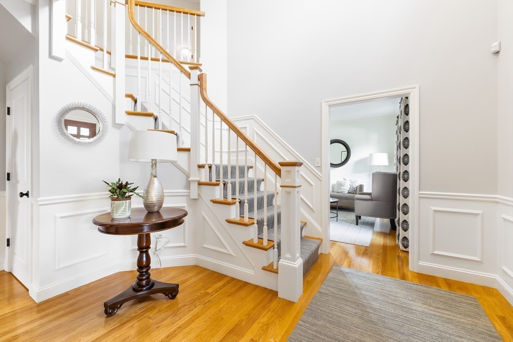 80 Emerson Road Needham, MA 02492 - Photo 5 of 41 a view of entryway and hall with wooden floor