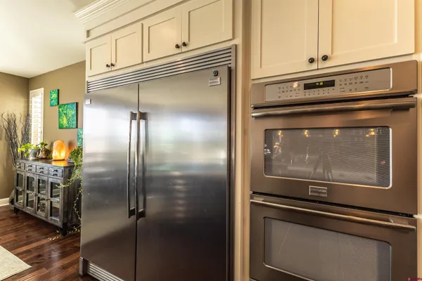 a kitchen with a stove and a microwave