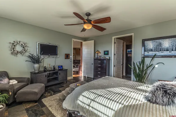 a kitchen with stainless steel appliances granite countertop a stove and a refrigerator