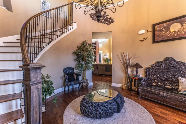 a living room with furniture and a rug