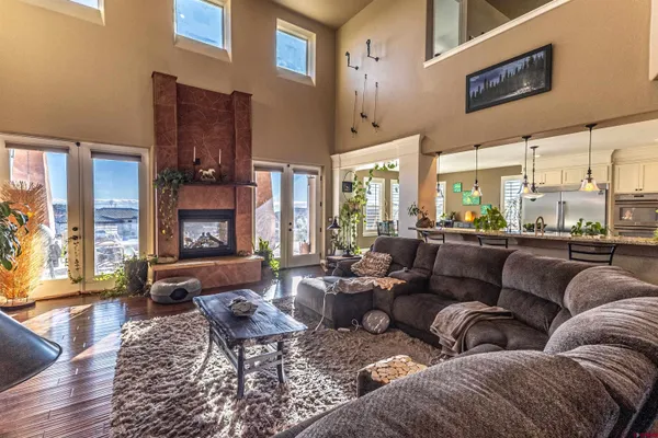 a kitchen with stainless steel appliances granite countertop a stove and a sink