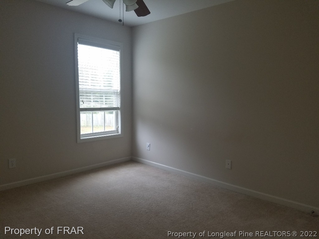 6715 Valley Falls Road Hope Mills, NC 28348 - Photo 10 of 13 an empty room with a window
