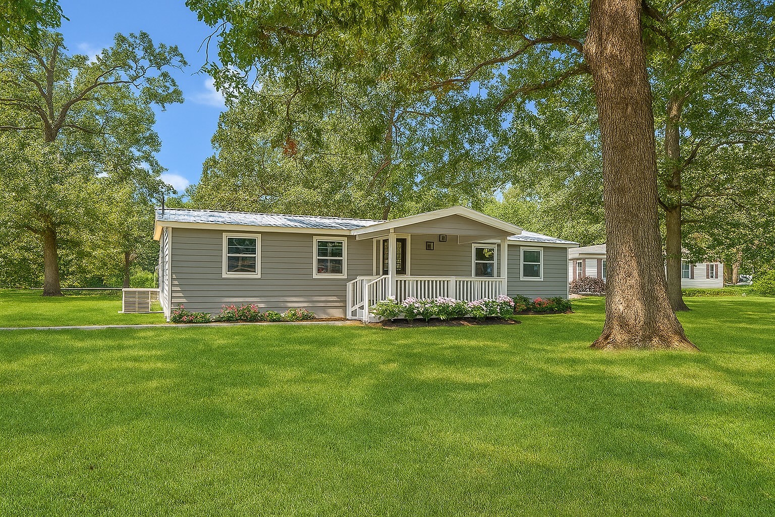 Front **Virtually Staged Flowerbeds**