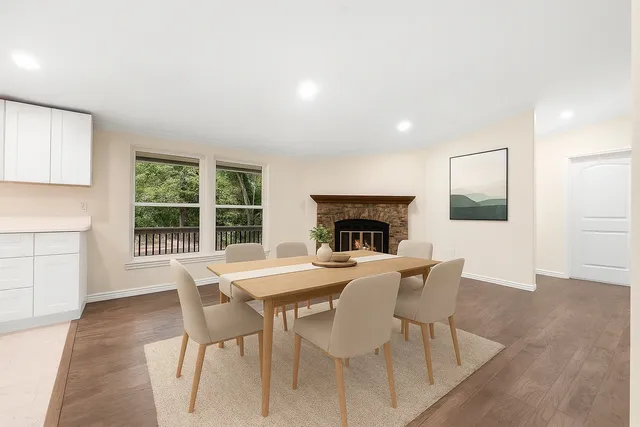 a view of a dining room with furniture window and outside view