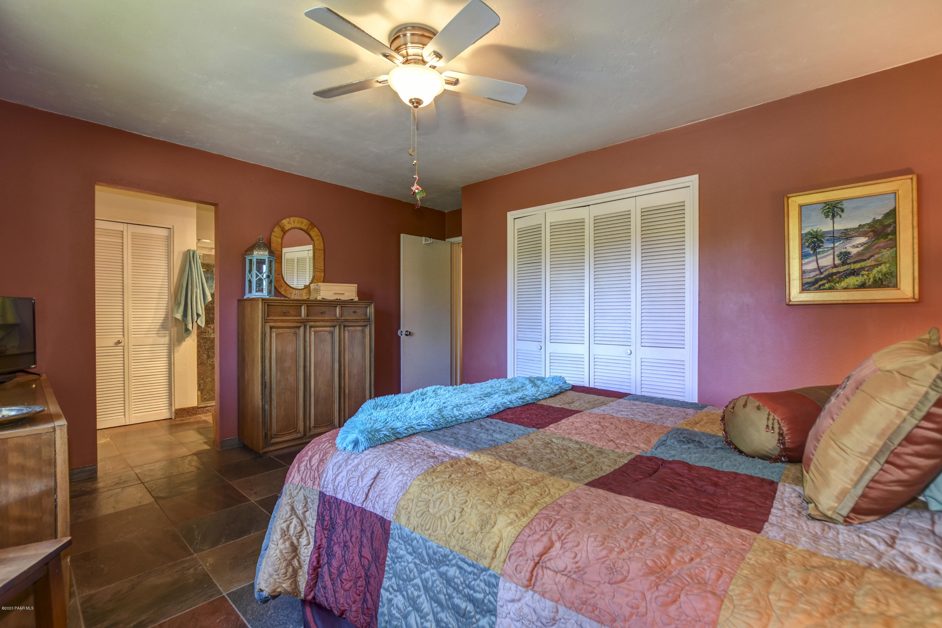1011 Norris Road Prescott, AZ 86305 - Photo 19 of 62 019_Master Bedroom with slate floors