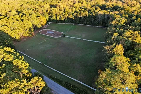 a view of balcony with wooden floor